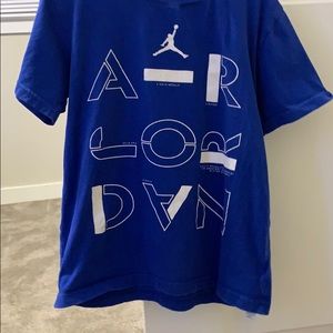 A blue Jordan shirt